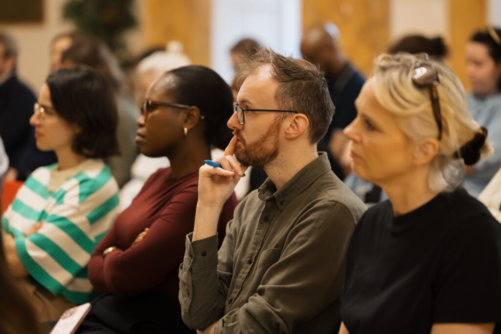 A row of an audience, looking forward. These are some of the attendees of the Community Foundation Ireland event.