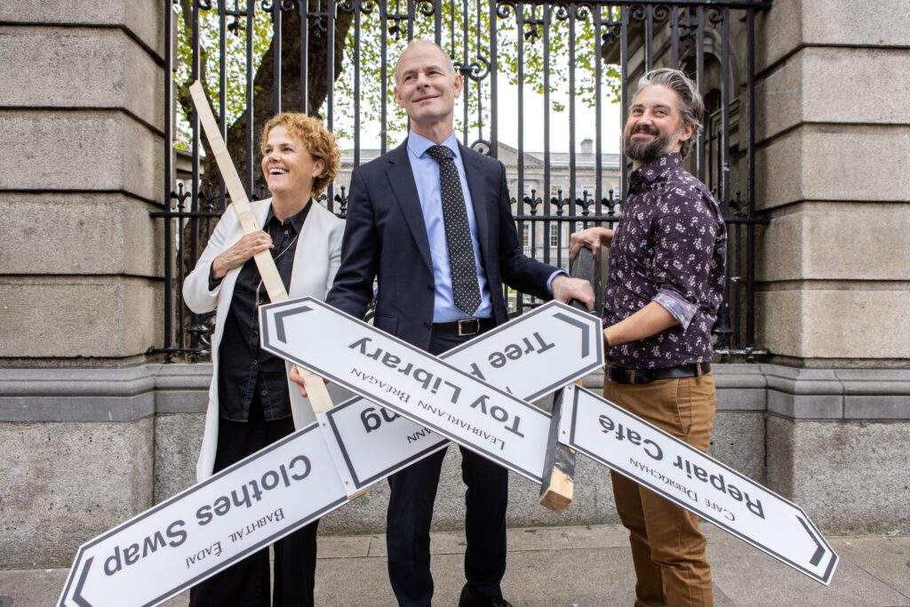 Holding sign posts to the Circular Economy, Denise from Community Foundation Ireland, Minister Ossian Smyth TD and Tad of VOICE