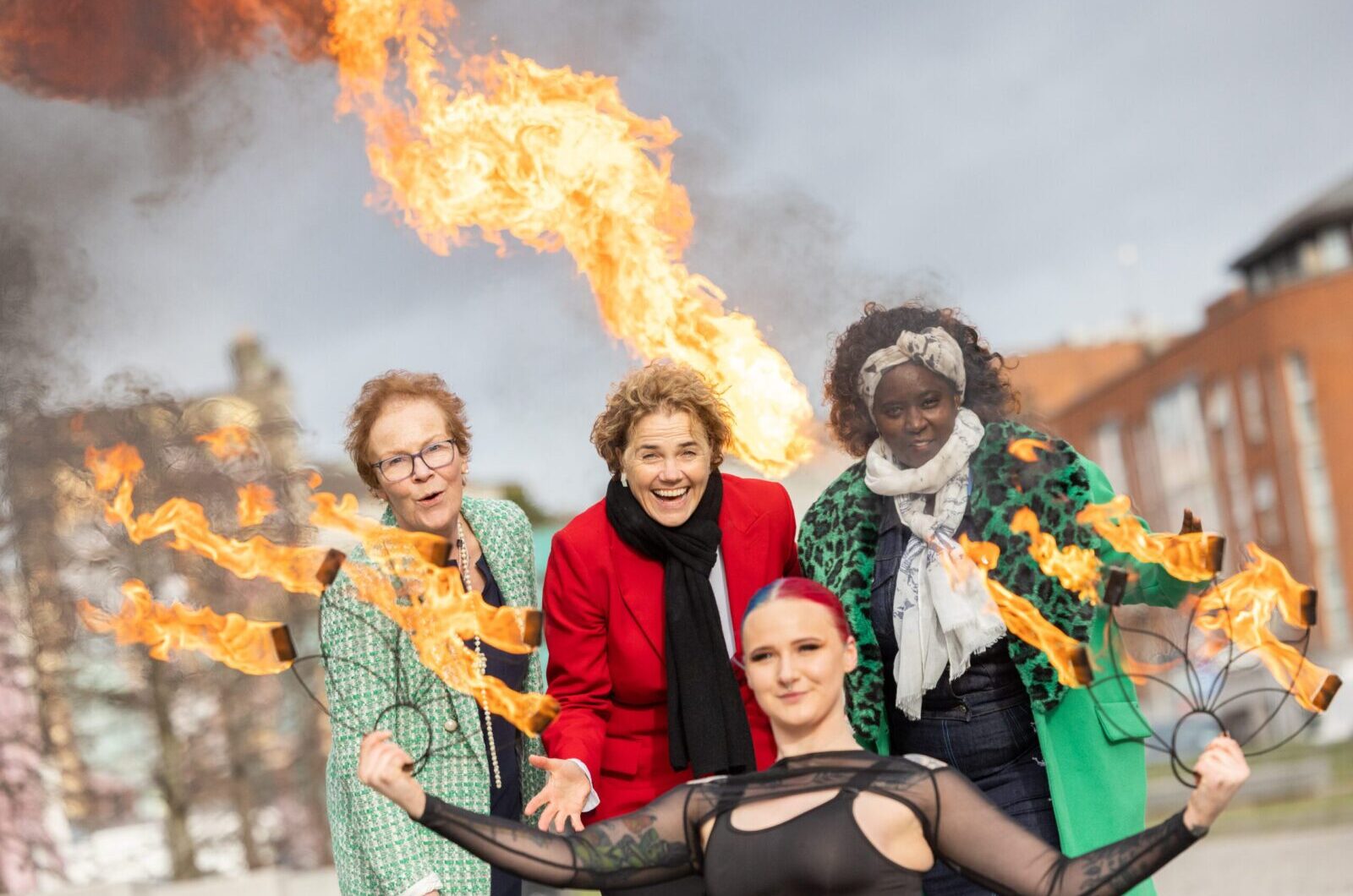 5-2-23
Sacred Fire in Smithfield Dublin as Community Foundation Ireland and it’s equality partners mark the new Brigid’s Holiday with a celebration of ‘Women, Community, Unity’. The Foundation has provided over €110 million in grants to support equality since 2000. 
Picture shows Firebreather Maiya with from left Noeline Blackwell of the Dublin Rape Crisis Centre; Denise Charlton of Community Foundation Ireland and Salome Mbugua of AkiDwa. Pic:Naoise Culhane-no fee